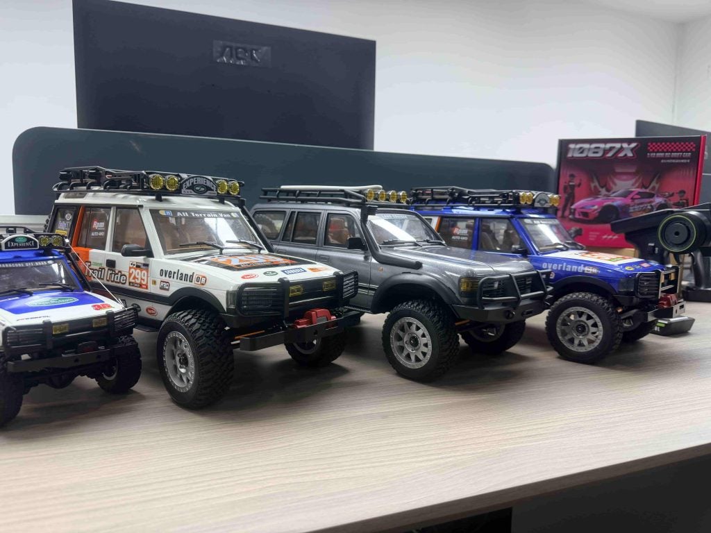 JXC RC cars displayed with export compliance documents for wholesale buyers