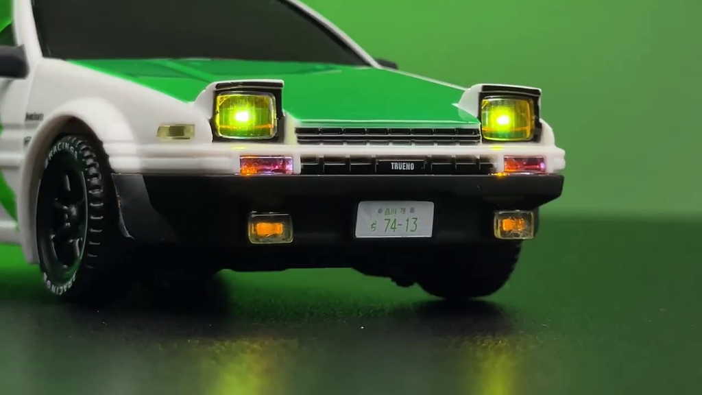 Front of the Drift King AE86 with pop up headlights and Trueno badge