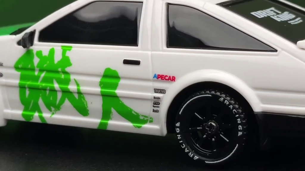 Close up of the shokunin calligraphy and Apecar badge on the AE86 door