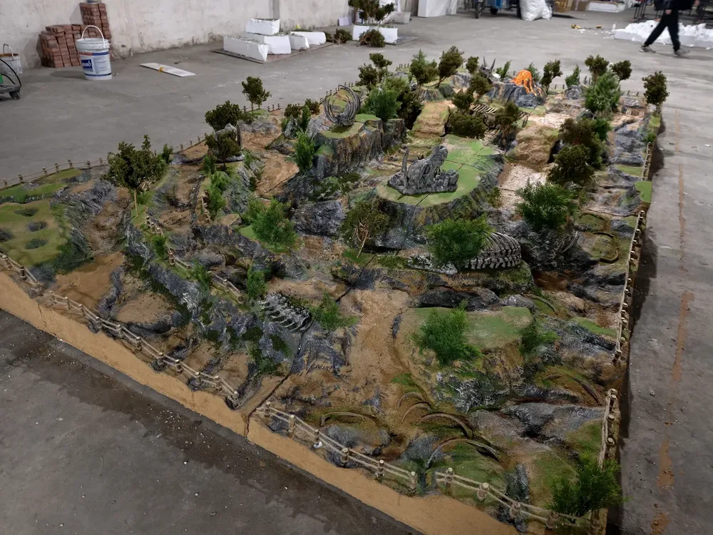 Fossil rock themed indoor RC diorama track built by JXC Model